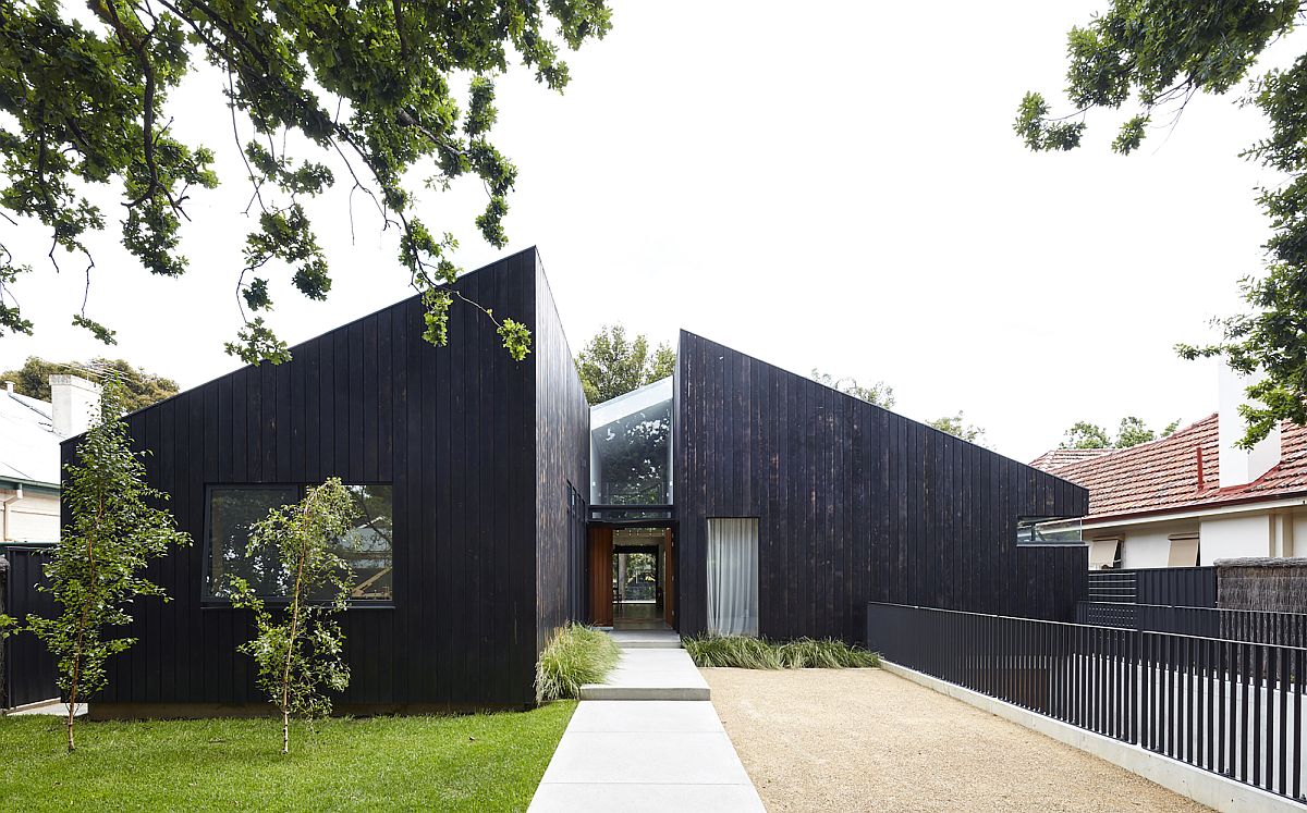 Cedar House Dark, Dashing Exterior Conceals Cozy, Minimal Living