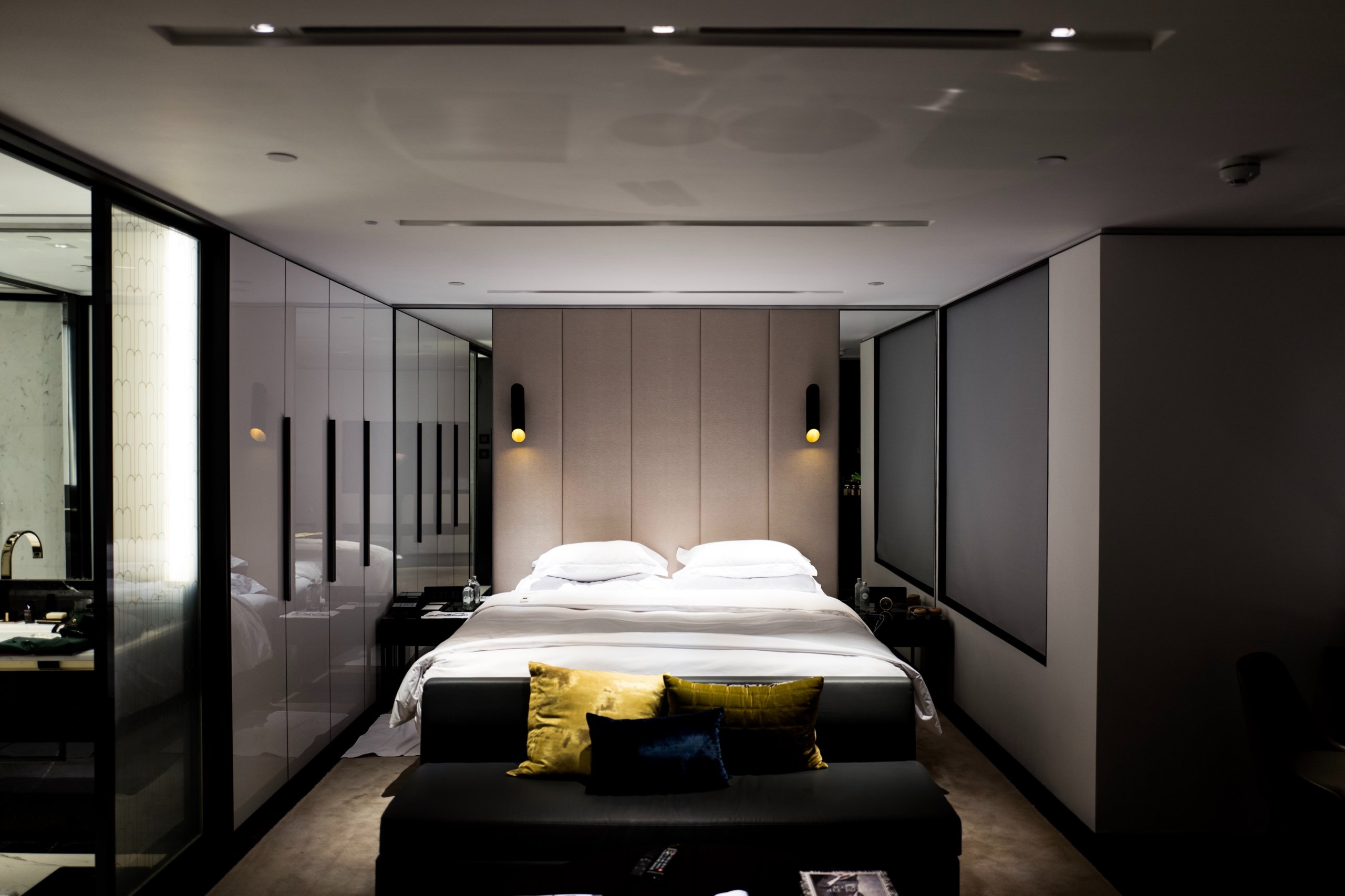 Modern bedroom with grey panel walls