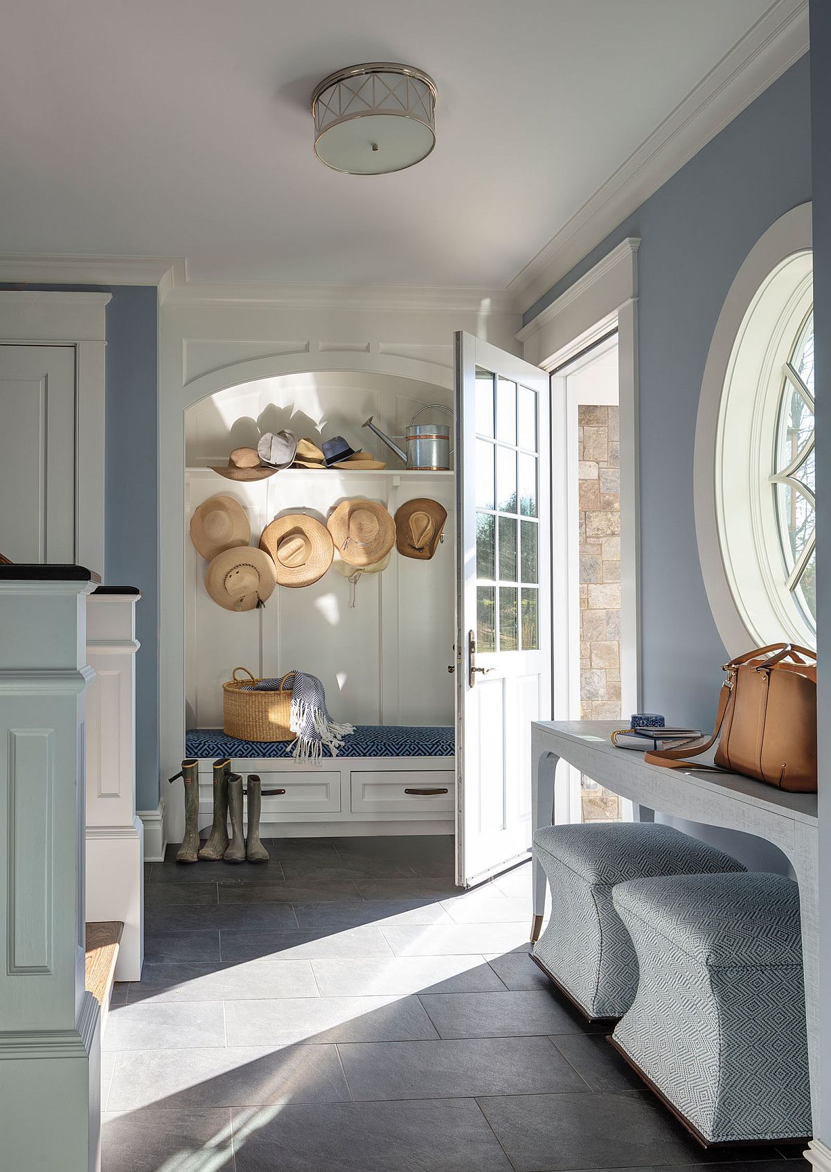 Even the smallest of homes can easily feature a functional mudroom that has it all