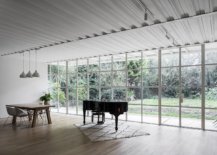 Framed-glass-walls-bring-the-outdoors-inside-while-illuminating-the-home-53199-217x155