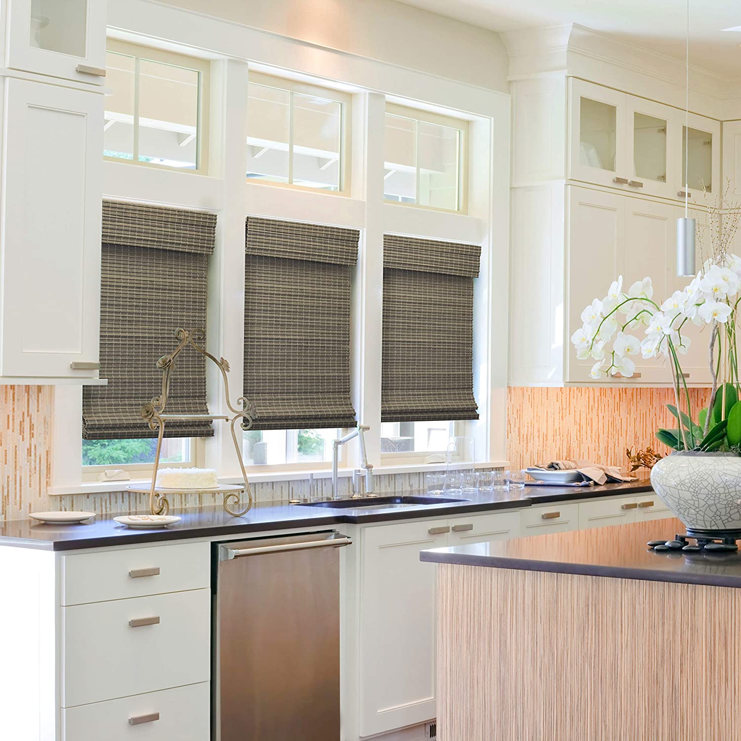 Kitchen with dark window covers