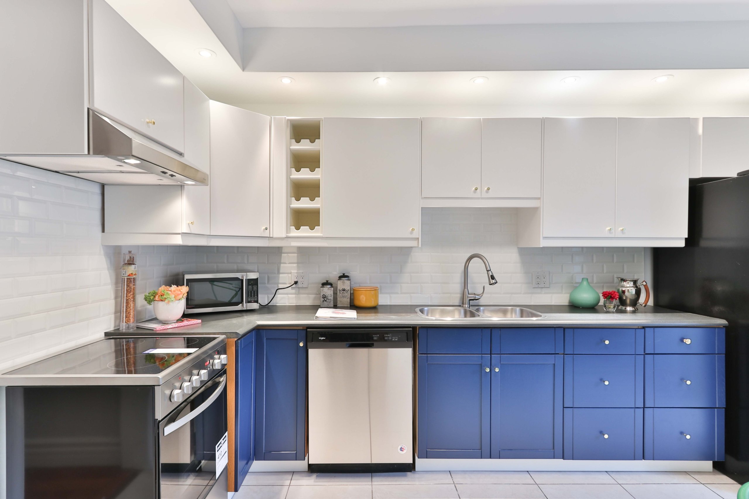 kitchen with a lot of storage cabinets