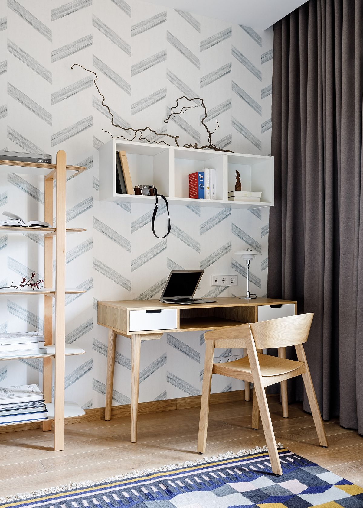 Modern Scandinavian style home office in Russian home in neutral hues with pattern in the backdrop