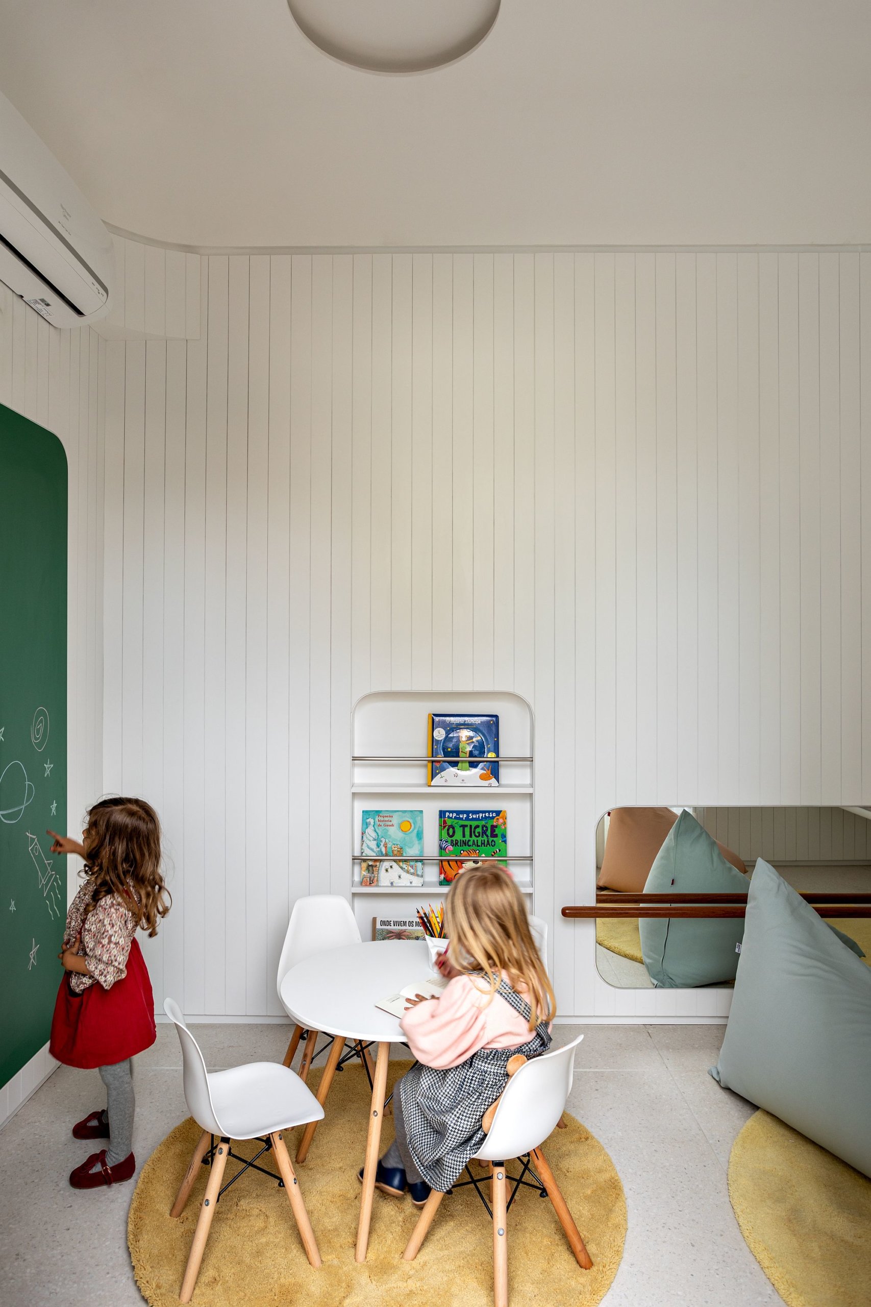 Modern kids' playarea in the common spaces of contemporary Brazilian building