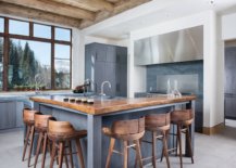 Modern-white-and-gray-kitchen-with-a-brilliant-wood-breakfast-bar-and-stools-68495-217x155