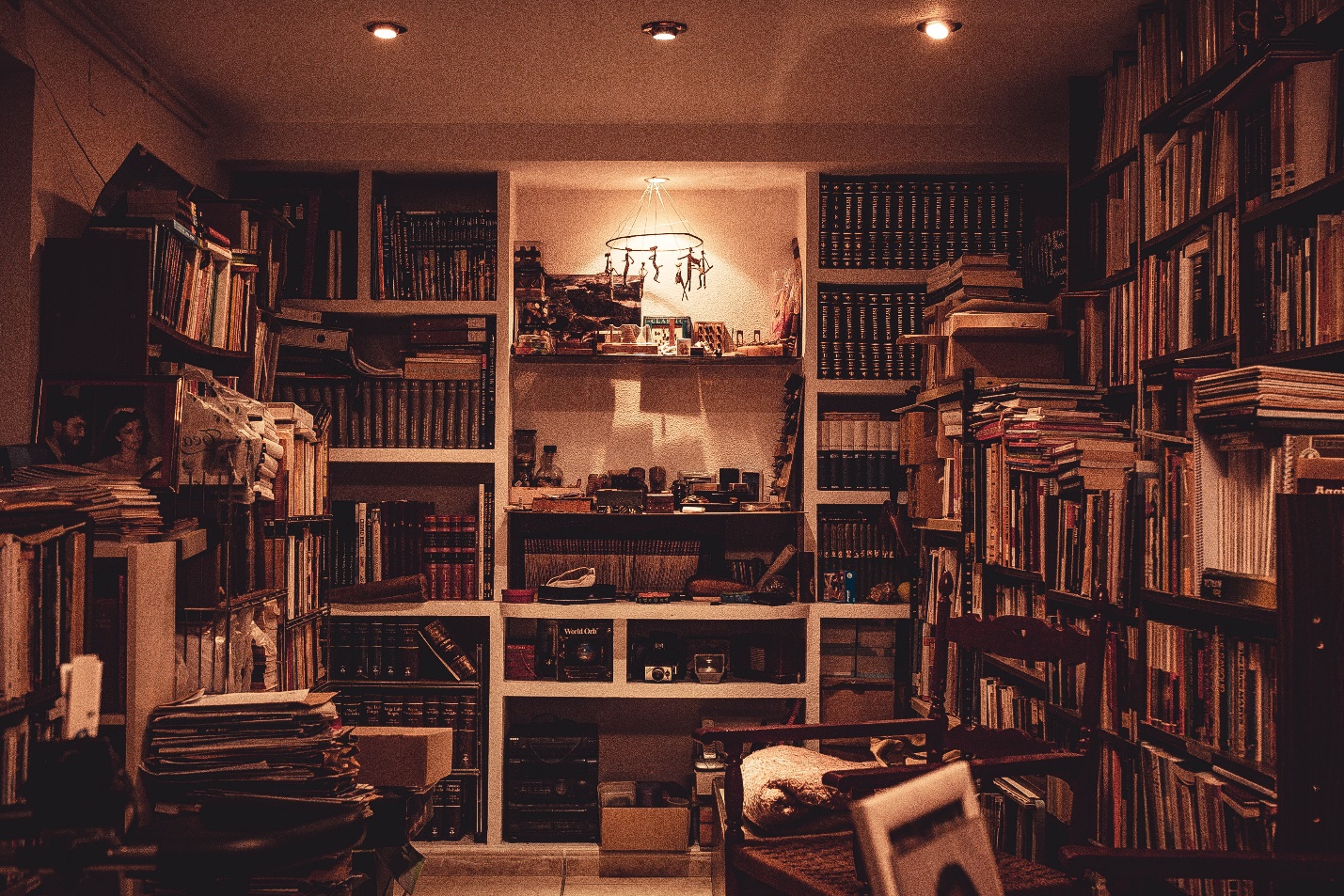 room filled with junk and books