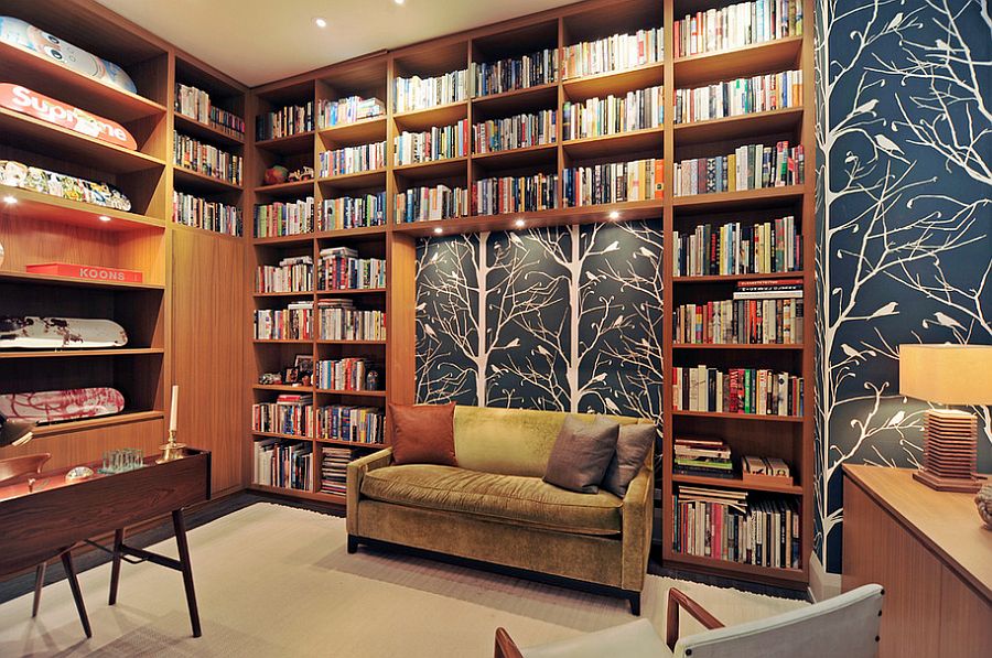 Series of books and wallpaper create the picture-perfect backdrop in this home office