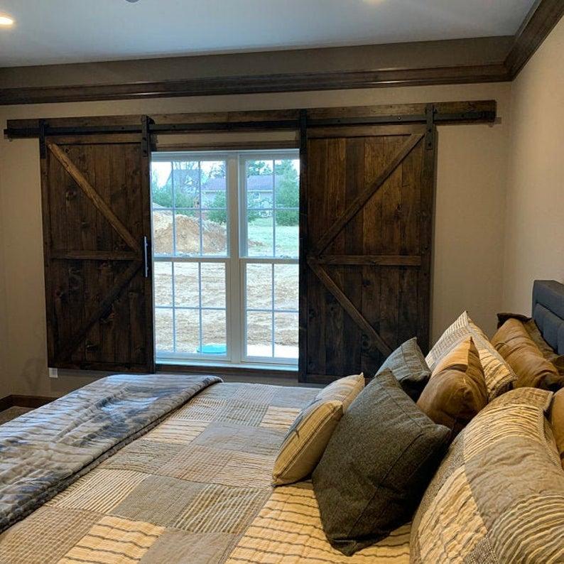 barn style shutters in bedroom