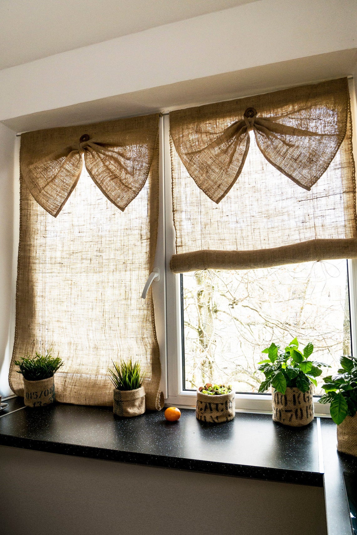 burlap curtain with bow decor