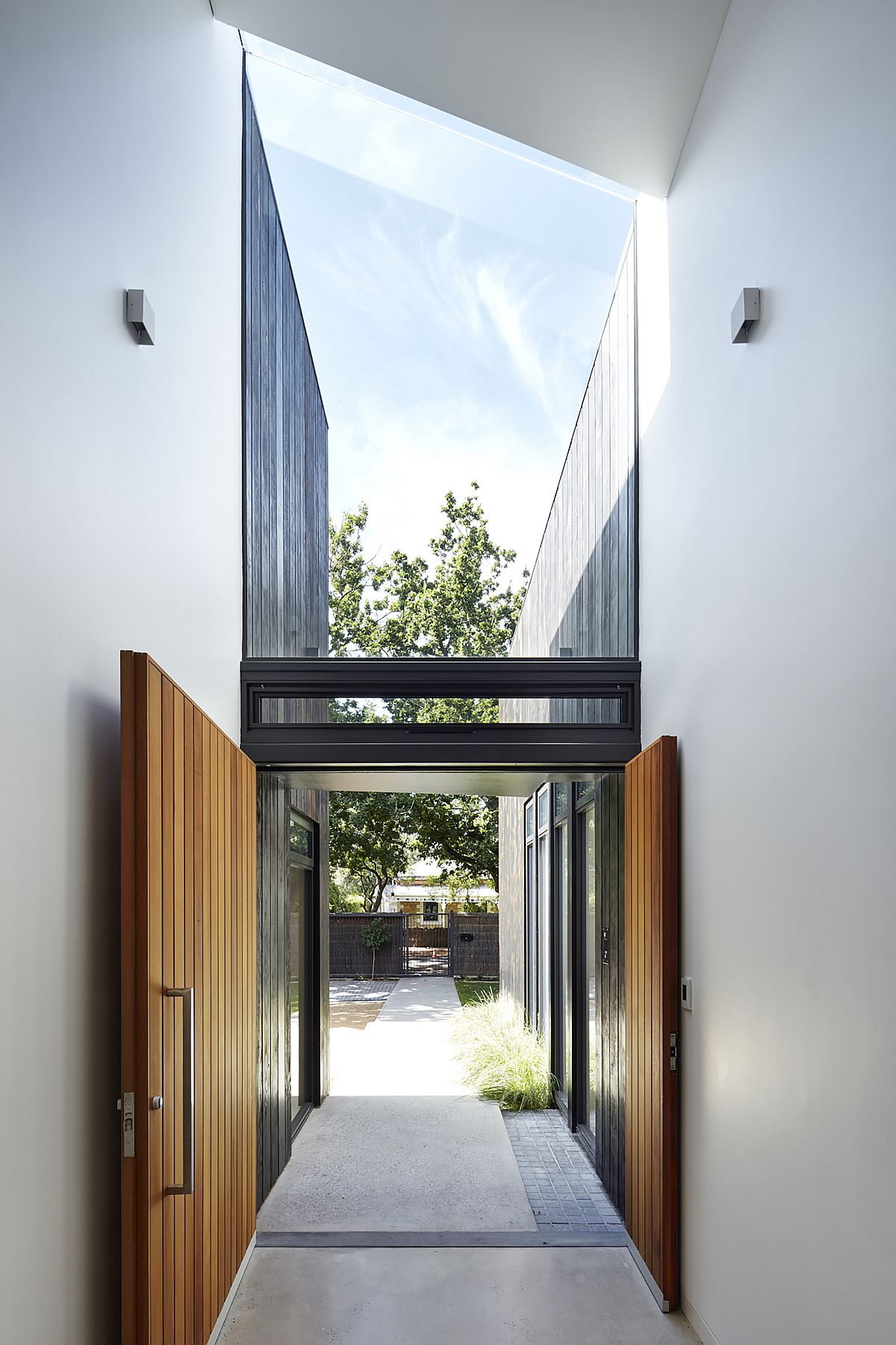 Spacious and stylish entrance of the house in white