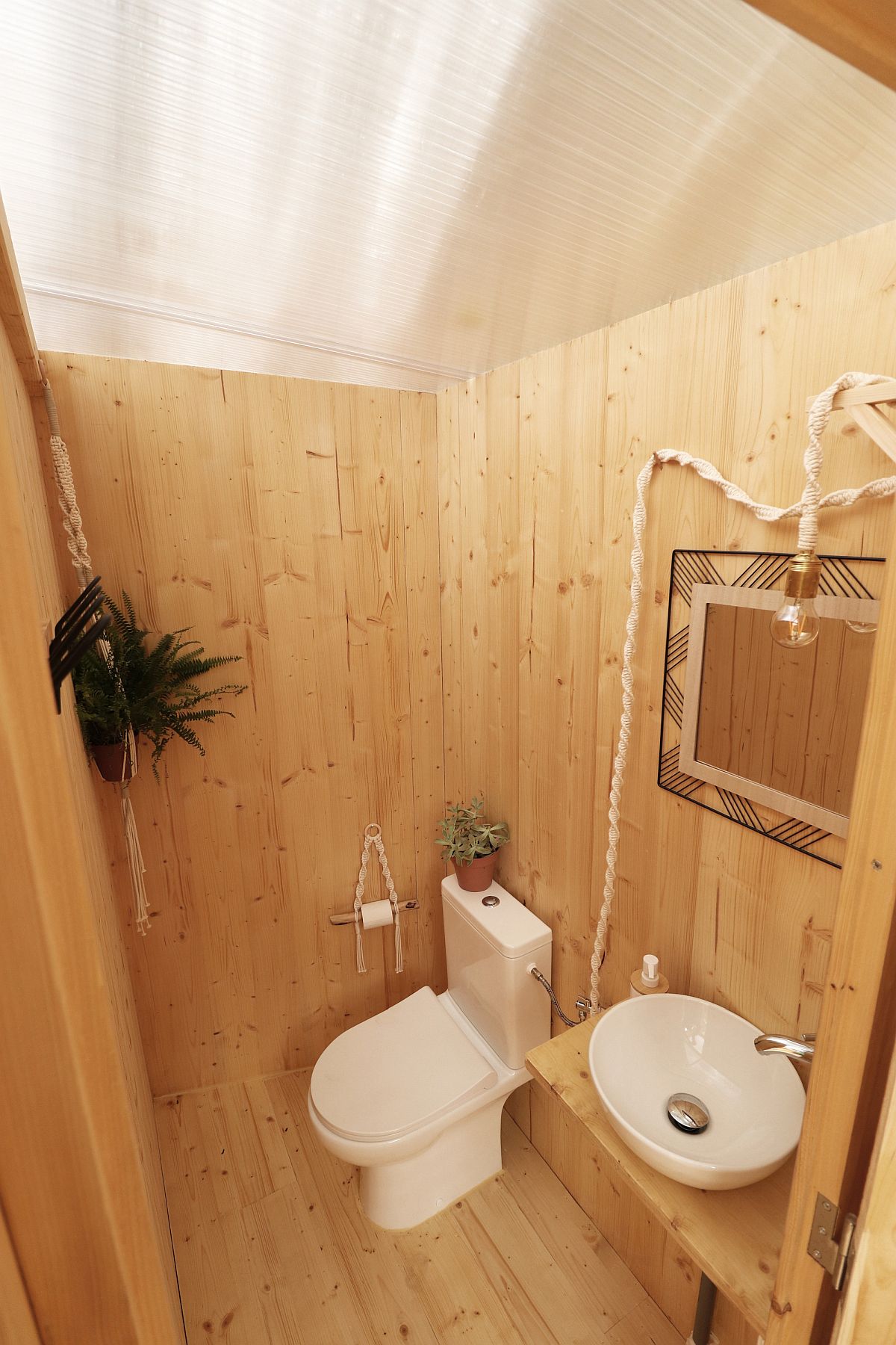 Tiny bathroom for the small yoga studio in the garden