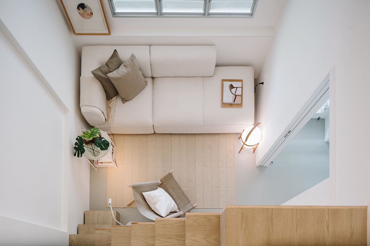 Ultra-small living room of the home with a couch that perfectly fits in