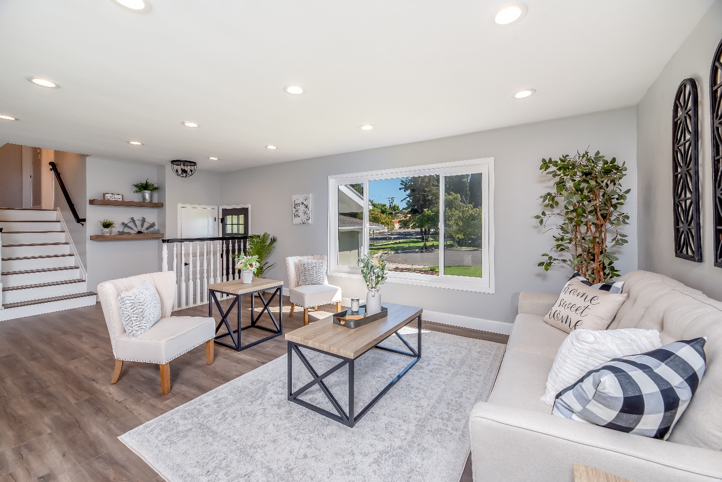 Living space with farmhouse coffee table and couch 