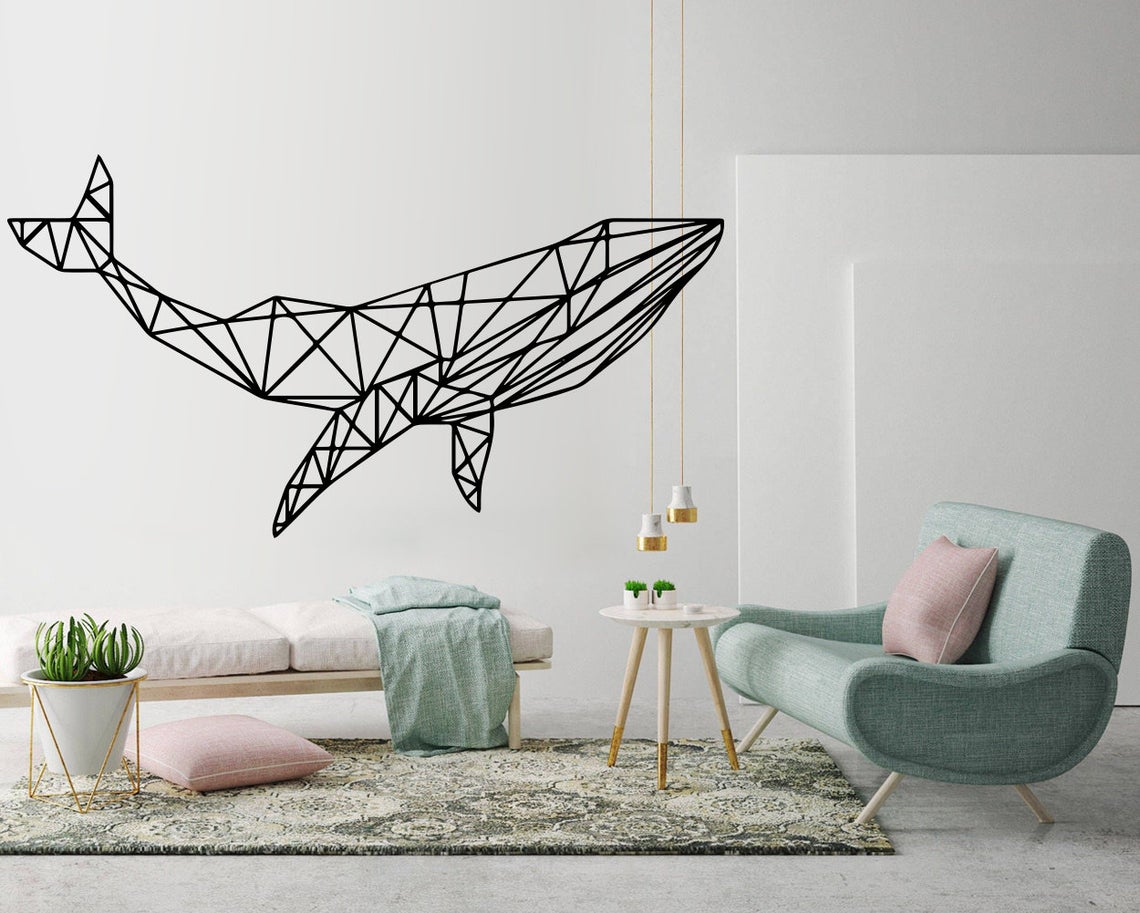 Whale painted on living room wall