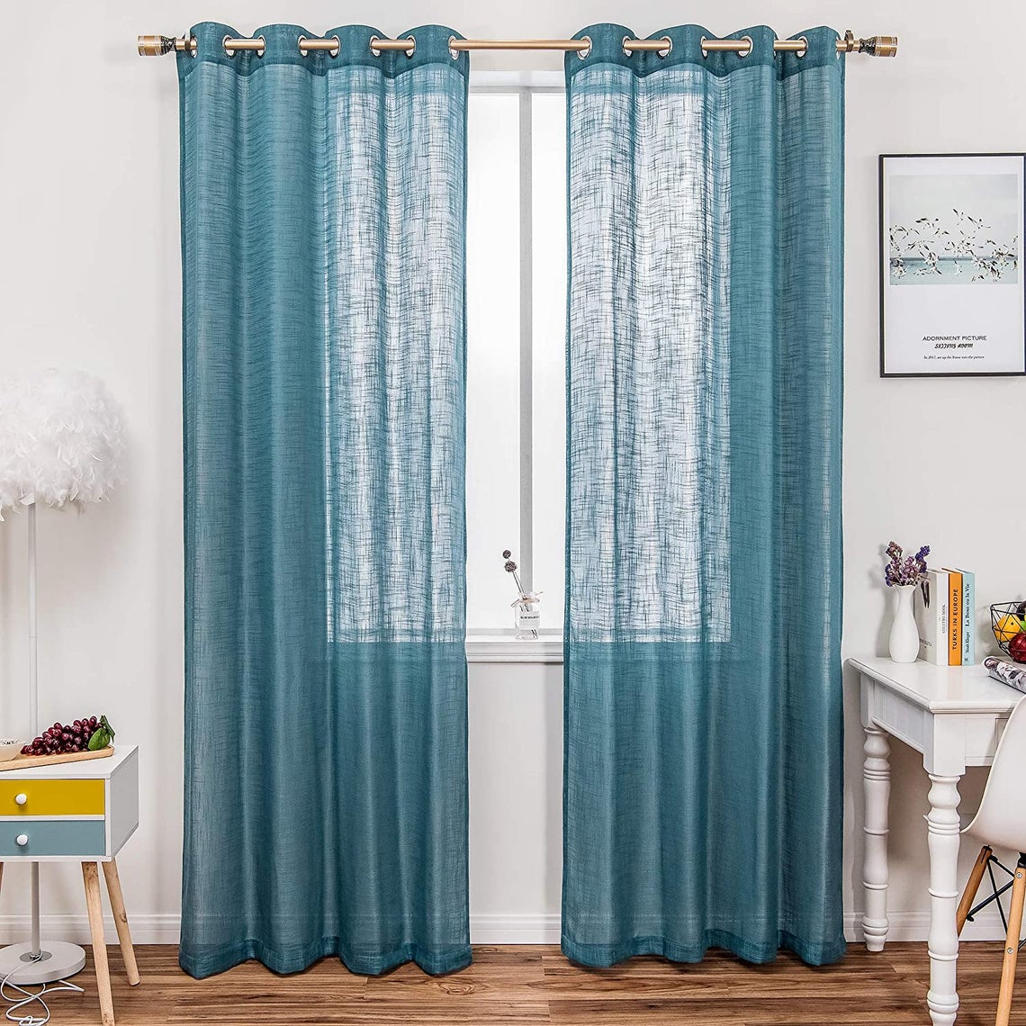 White room with blue curtain