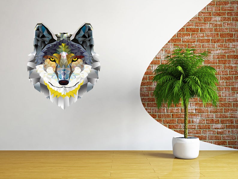 Wolf design on a wall with plant