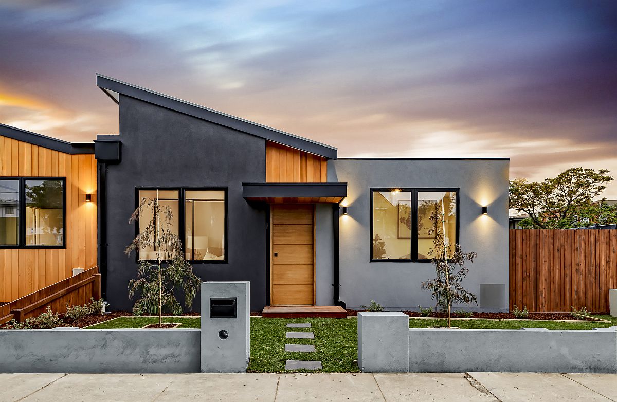 Wood, light gray and dark gray are combined in a polishedfashion to create this home exterior