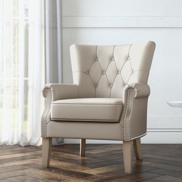 Beige chair with diamond tuft design and nail-head trim