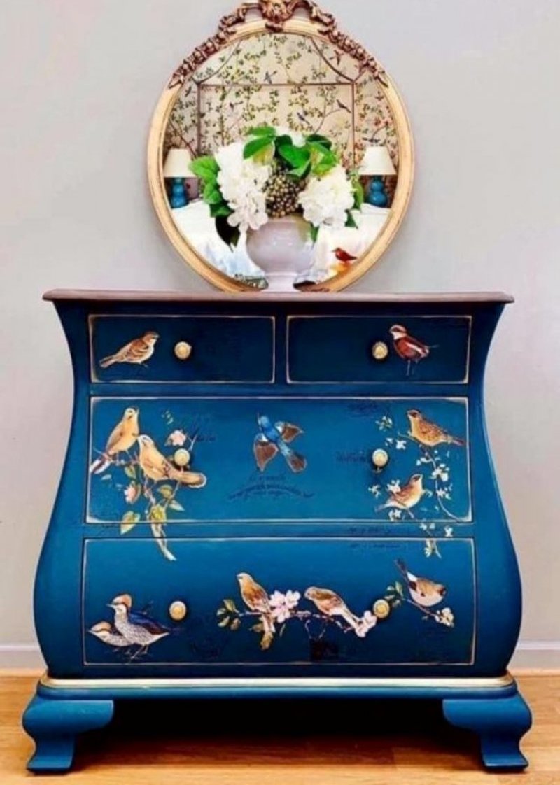 Blue drawer with bird painting