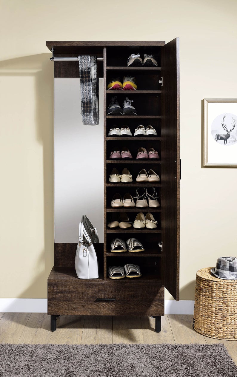 Cabinet full of shoes with a bag and a hanging scarf