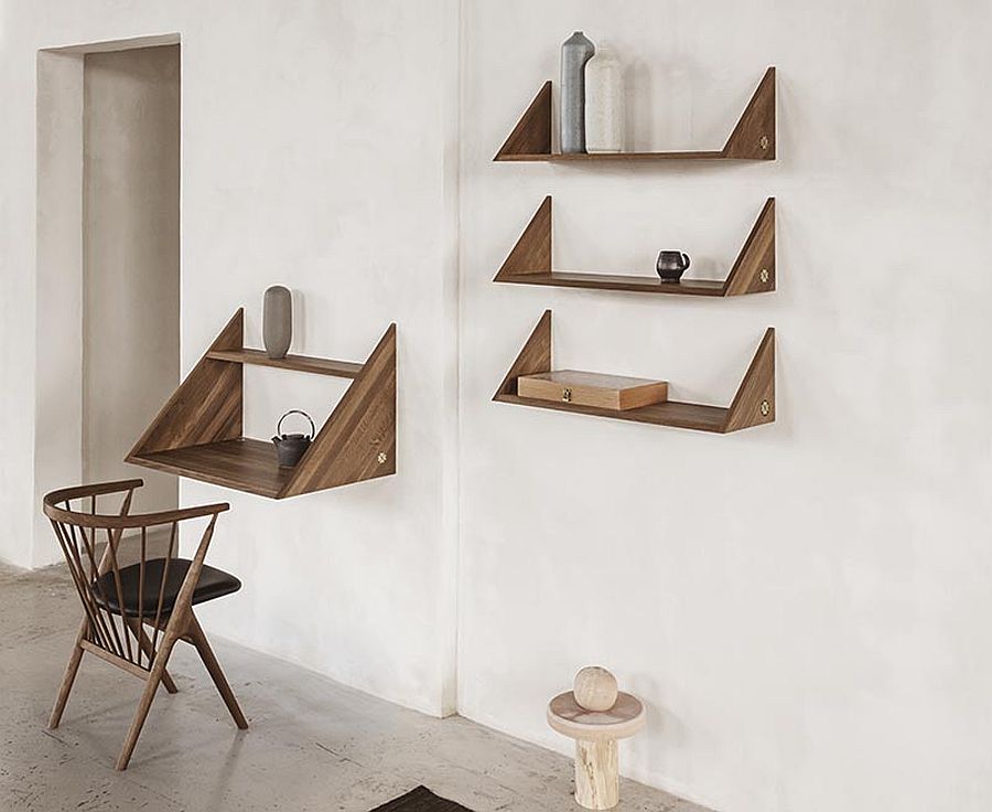 Combine the stylish wall-mounted desk in the corner with floating wooden shelves