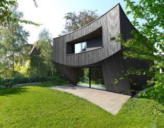 Innovative Curve Meets the Swiss Box at this Fabulous Wooden House