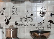 Cute wall decals in tiled kitchen wall