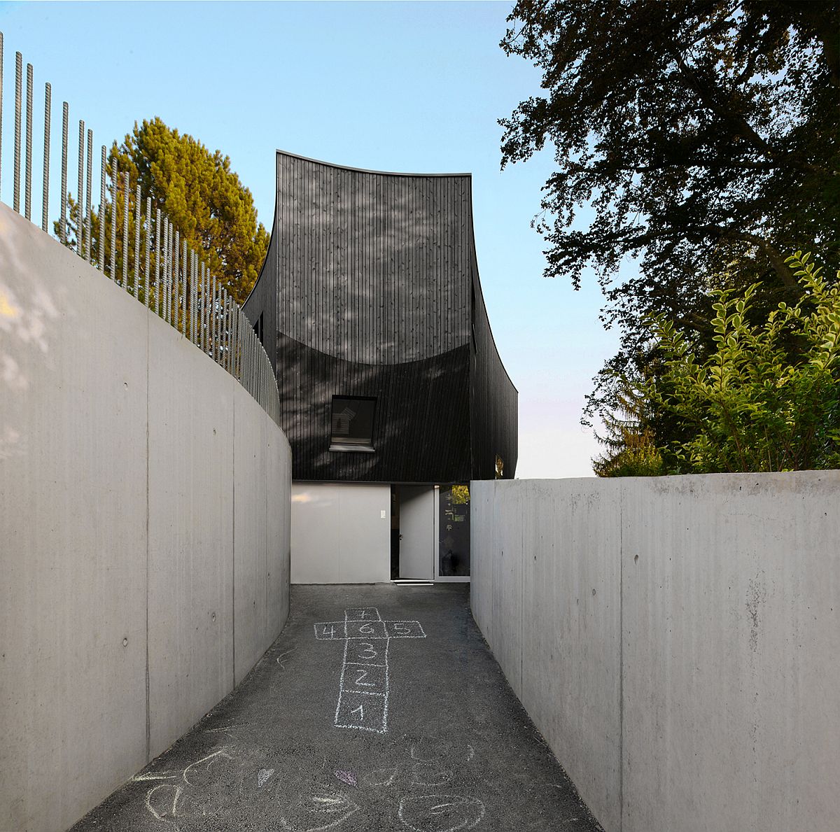 Entry to the house with a walkway feels secluded and stylish