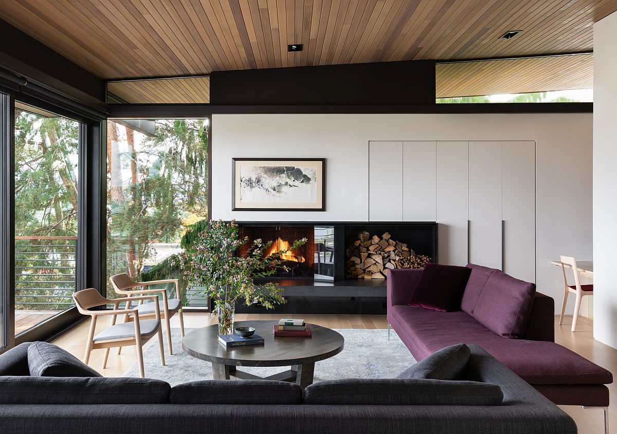 Eye-catching splash of purple enlivens the modern living room in neutral hues