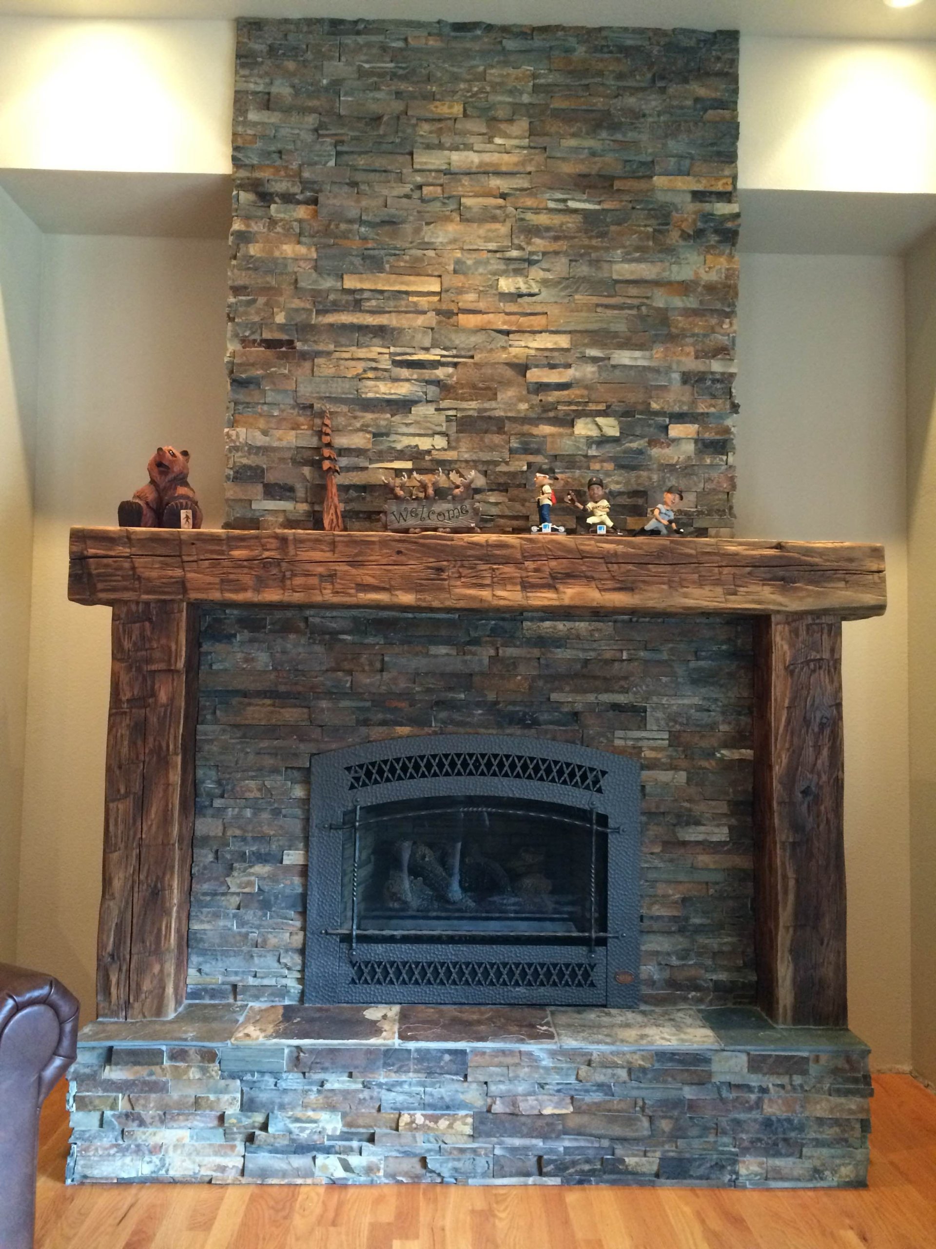 Distressed Painted Brick Fireplace: A Blend of Rustic Charm and Modern Style