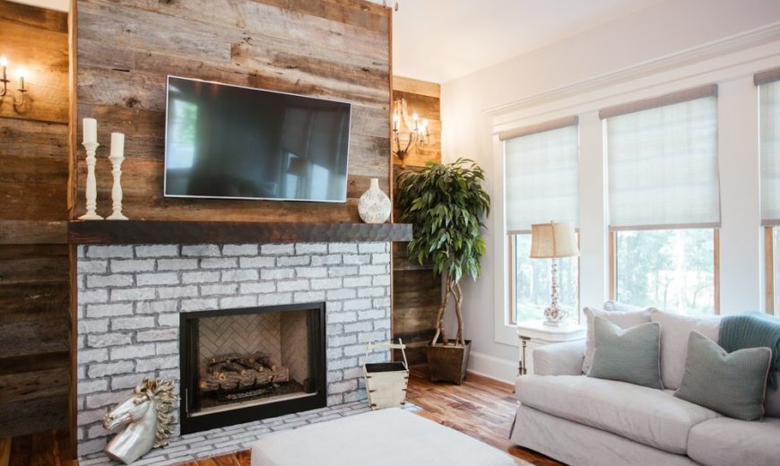 living room with brick fireplace