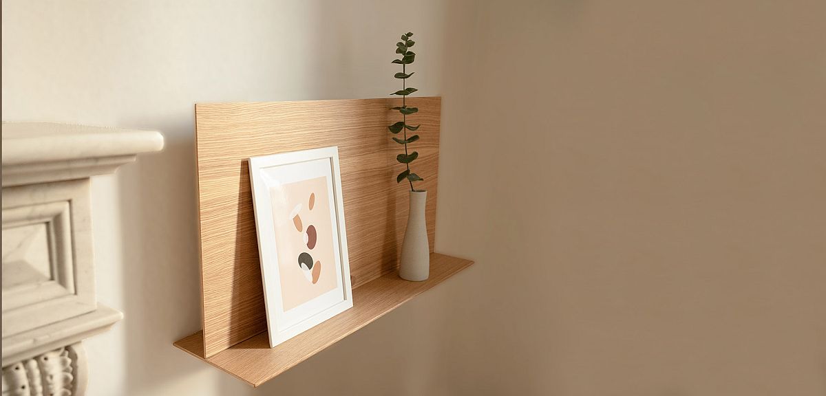 Floating desk turnd into a shelf when not in use