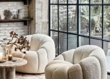 Fuzzy white round chair in beside window panels