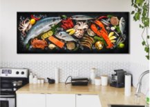 Large seafood painting on kitchen wall