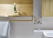 Light-wood-elements-in-the-bathroom-bring-elegance-and-warmth-to-the-white-space-49138-217x155