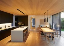 Lovely-woooden-ceiling-and-floor-stand-in-contrast-to-the-dark-kitchen-backdrop-27261-217x155