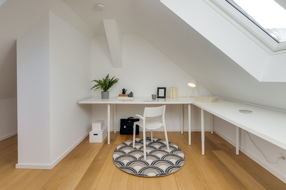 Modern space-savvy home office in white with ample natural light