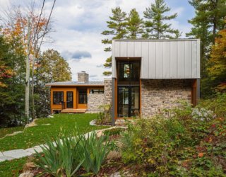 Welcoming Wilderness Indoors: Stone and Wood Escape with Lovely Lake Views