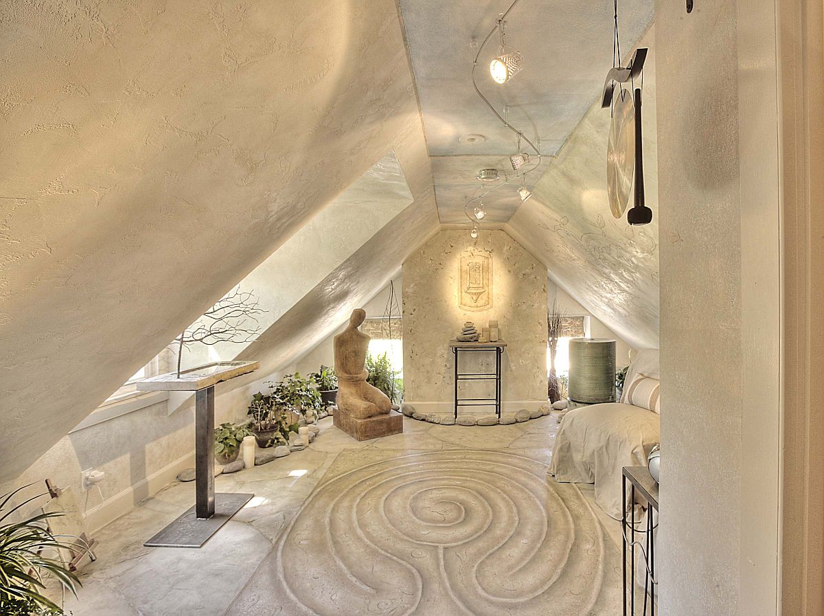 Sand garden, lighting and a beautiful backdrop help create this meditation room