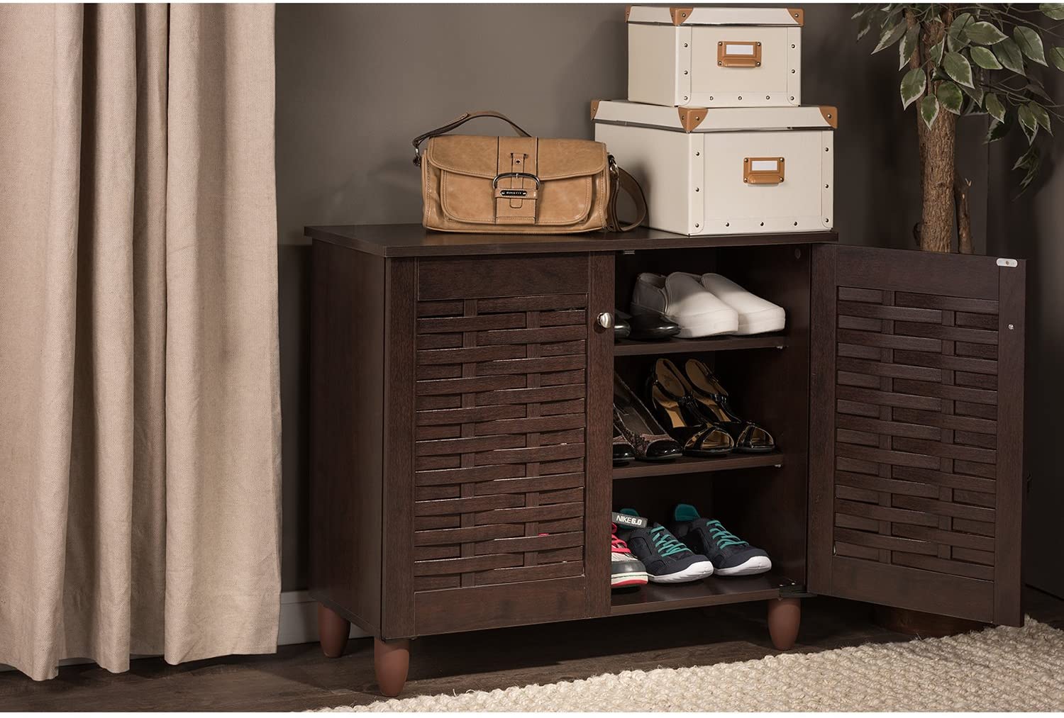 Shoes stored in a brown cabinet