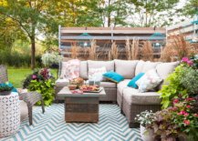 Small-and-elegant-backyard-patio-with-chevron-pattern-rug-and-comfy-decor-exudes-shabby-chic-style-47183-217x155