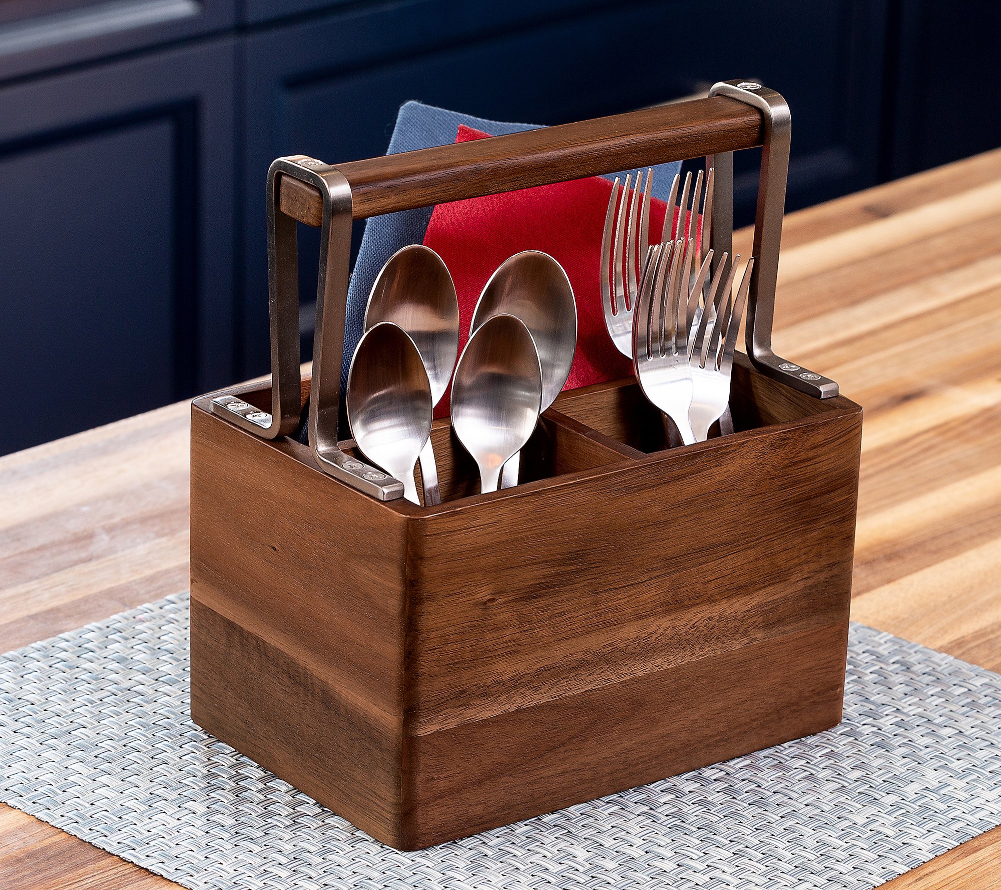 Spoon and fork inside a wood storage with handle