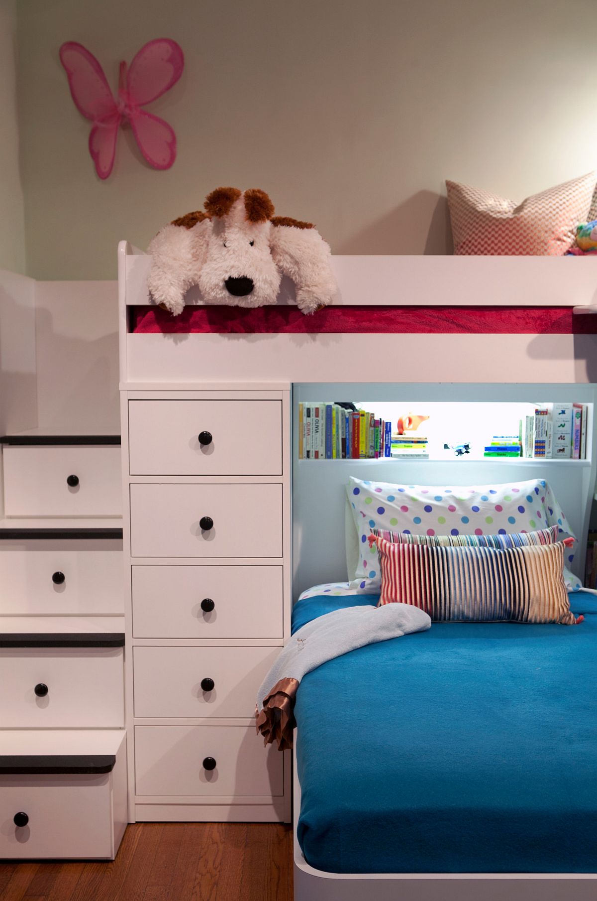 Steps leading to the loft bed in the kids' room also provide additional storage space