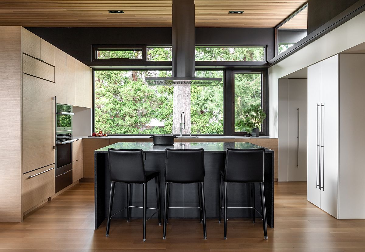 Stone kitchen island with breakfast bar and matching bar chairs