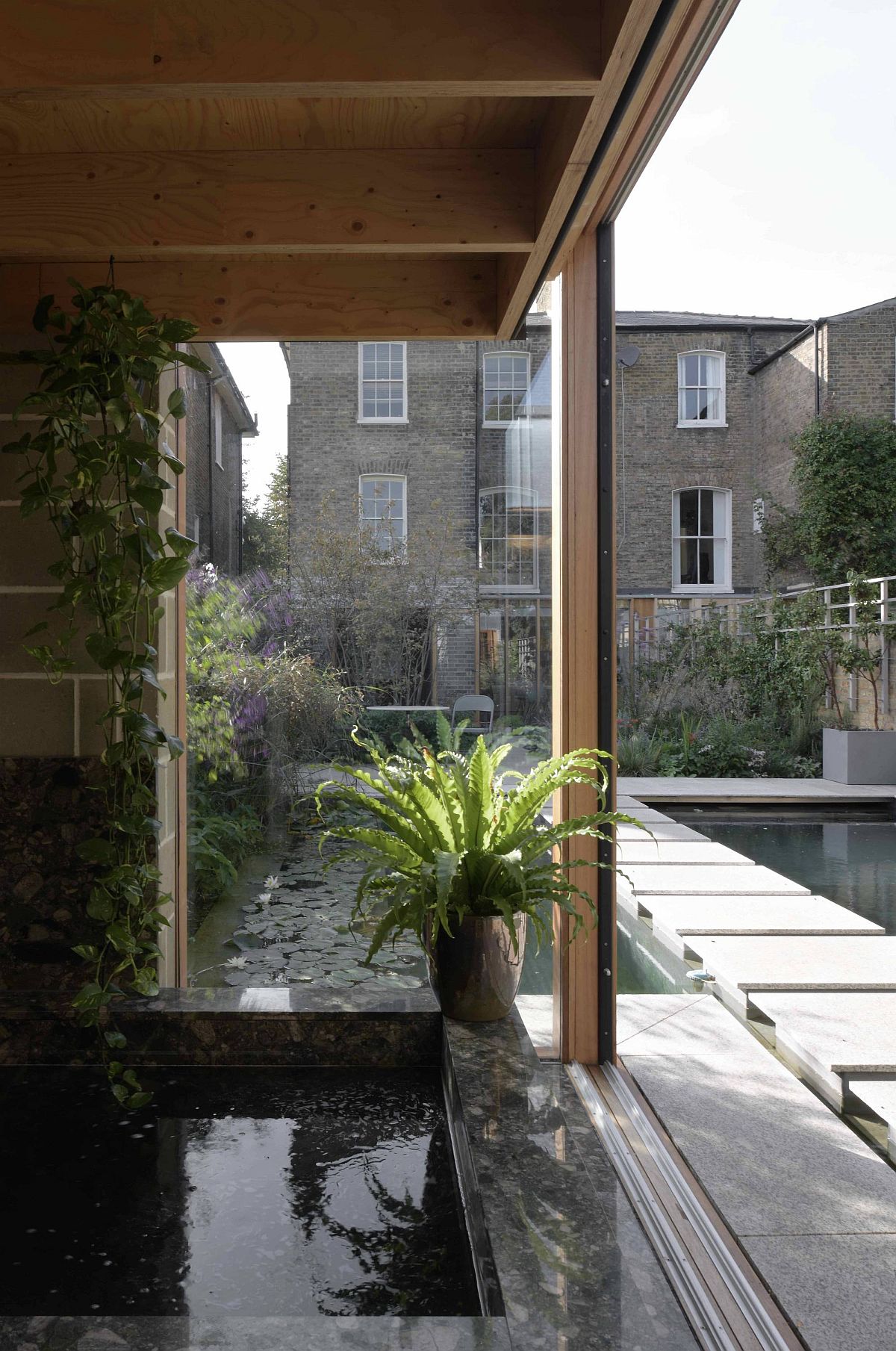 Water features and greenery become a natural part of the lovely garden room