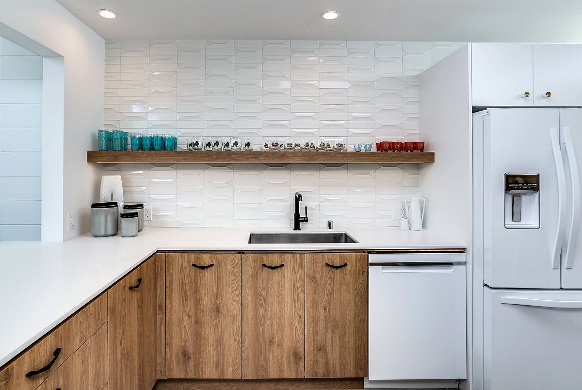 White backdrop in the kitchen allows the woodsy cabinets to shine through