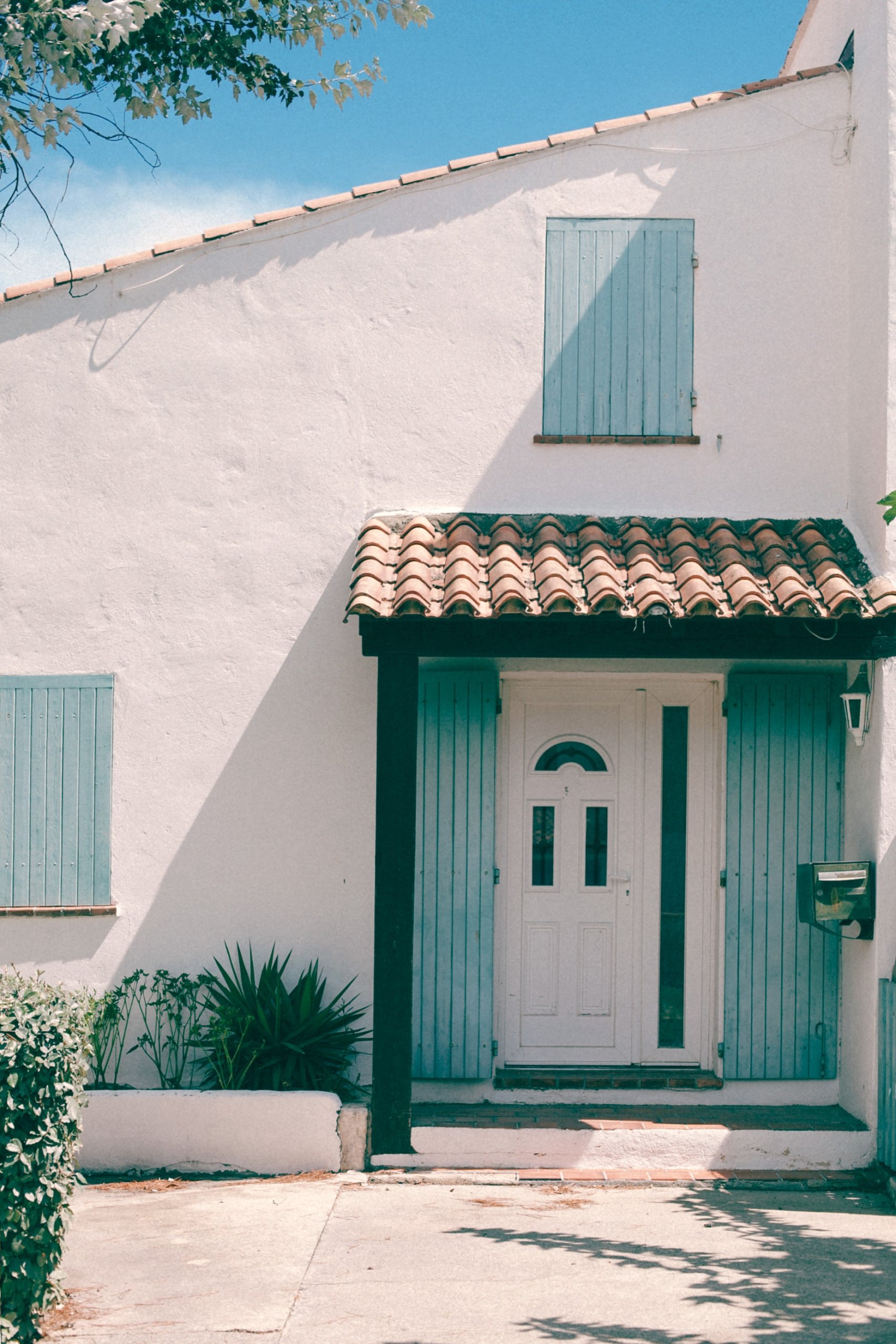 White house with blue shutters