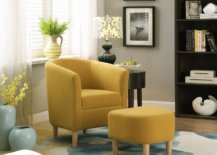 Yellow chair with yellow leg rest in stylish living room