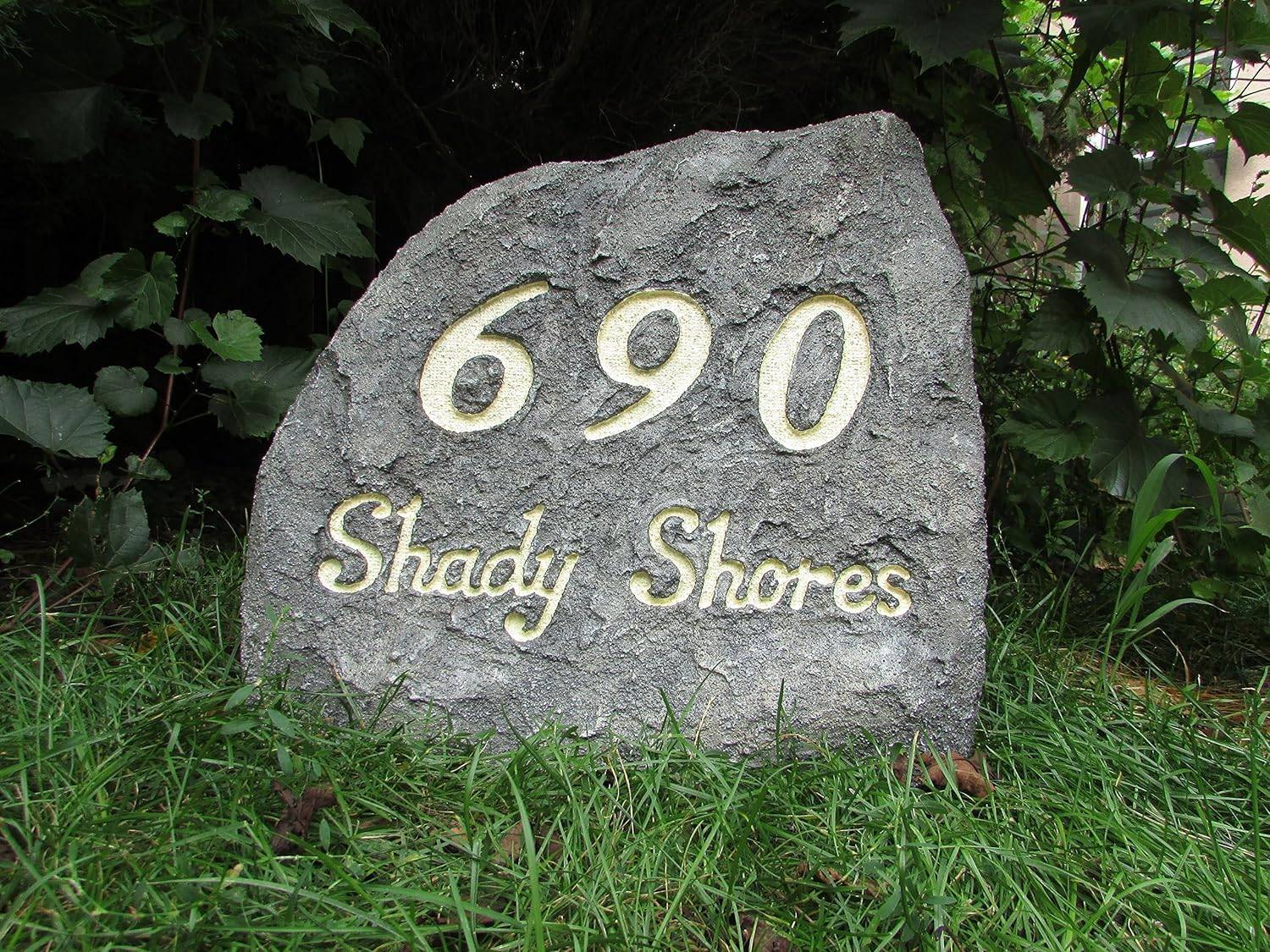 Stone with a house number on it.
