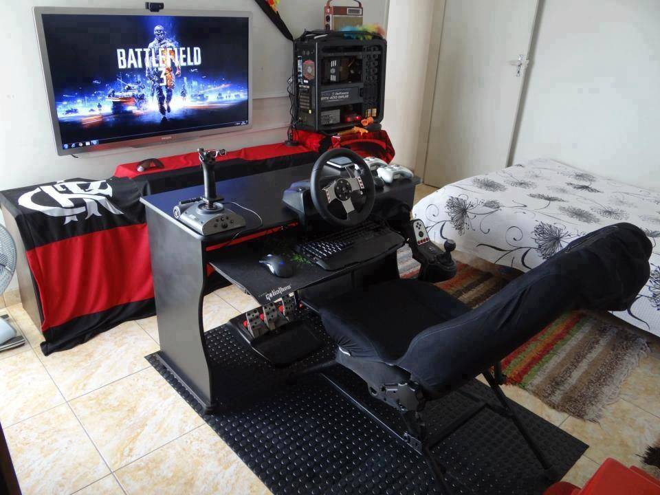 bedroom with elaborate video game set up